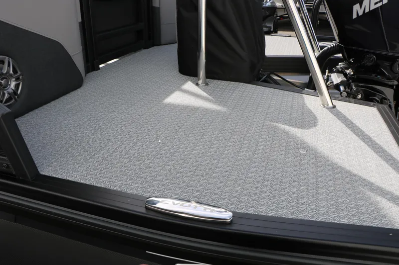 Slide: The Image of Evotti 521QL 2026 boat deck with textured flooring and metal accents. - 53