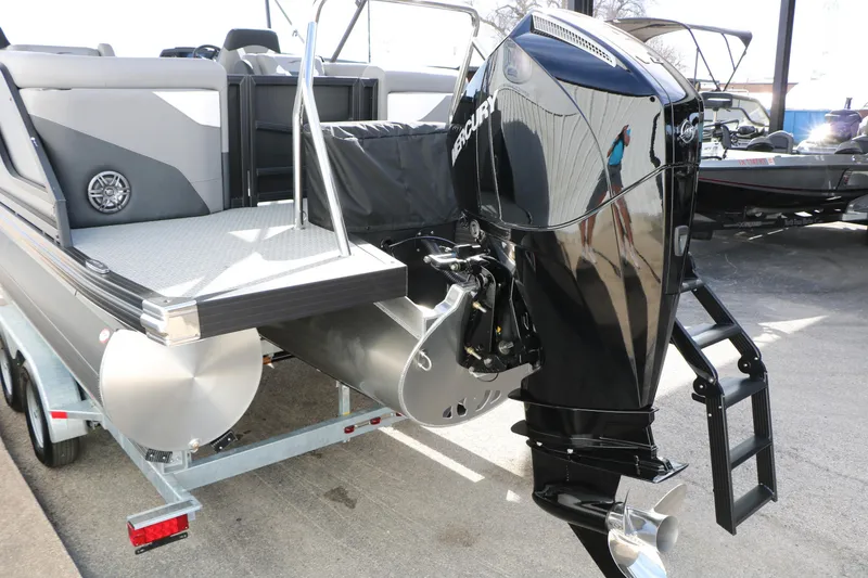 Slide: The Image of 2026 Evotti 521QL boat with Mercury outboard motor on trailer. - 64