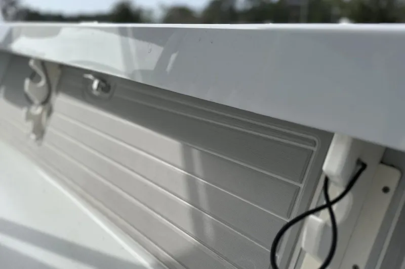 Slide: The Image of 2024 Pathfinder 2200 TRS boat interior detail with hooks and wiring. - 15