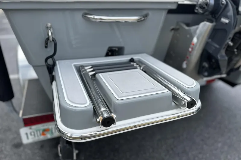 Slide: The Image of 2024 Pathfinder 2200 TRS boat with foldable swim ladder and stainless steel fittings. - 7