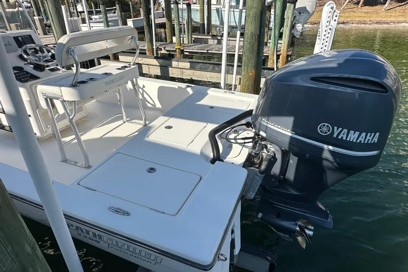 Slide: The Image of 2012 Pathfinder 2200 Tournament Edition boat with Yamaha outboard motor at dock. - 12