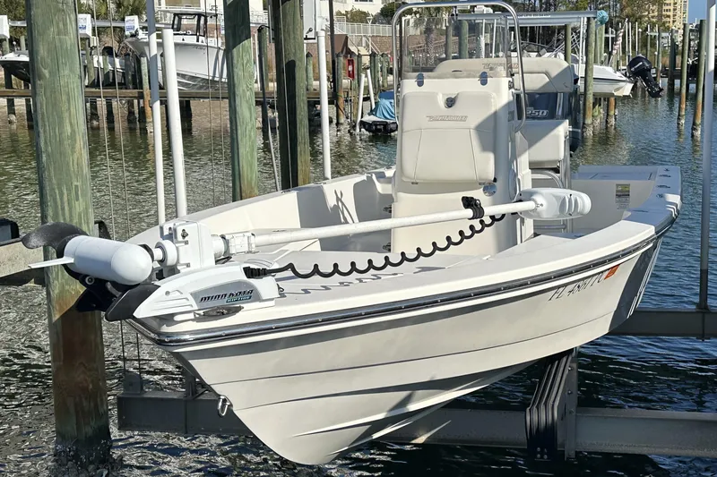 Slide: The Image of 2012 Pathfinder 2200 Tournament Edition boat docked at marina. - 9