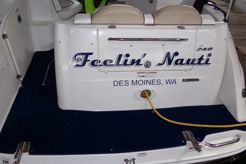 Slide: The Image of 2009 Searay Sundancer boat named "Feelin' Nauti" docked in Des Moines, WA. - 10