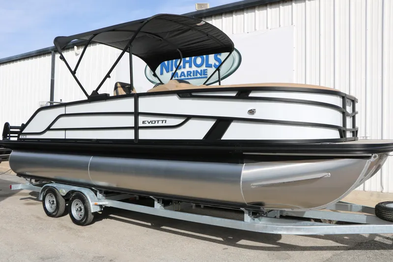 The Image of 2026 Evotti 523CS pontoon boat on trailer, displayed at Nichols Marine. - 0