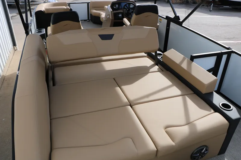 Slide: The Image of Luxurious seating on 2026 Evotti 523CS boat, featuring beige upholstery and modern design. - 22