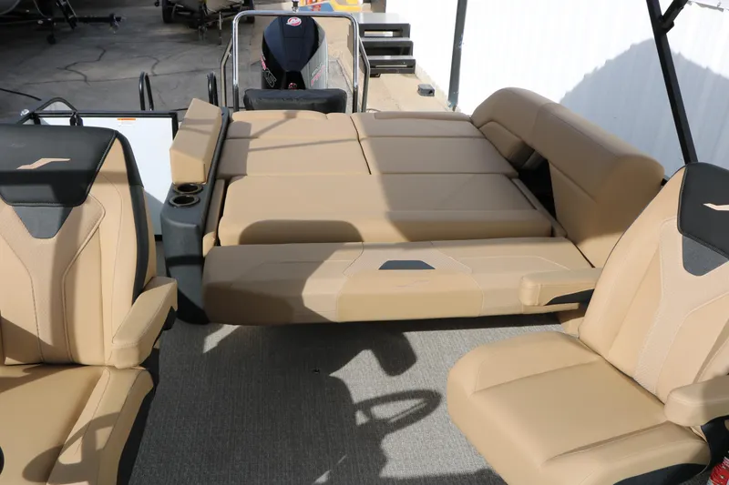 Slide: The Image of Luxurious seating on 2026 Evotti 523CS boat, featuring beige and black upholstery. - 24