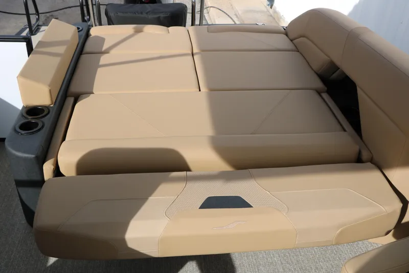Slide: The Image of Luxurious beige seating on 2026 Evotti 523CS boat, featuring cup holders and modern design. - 25