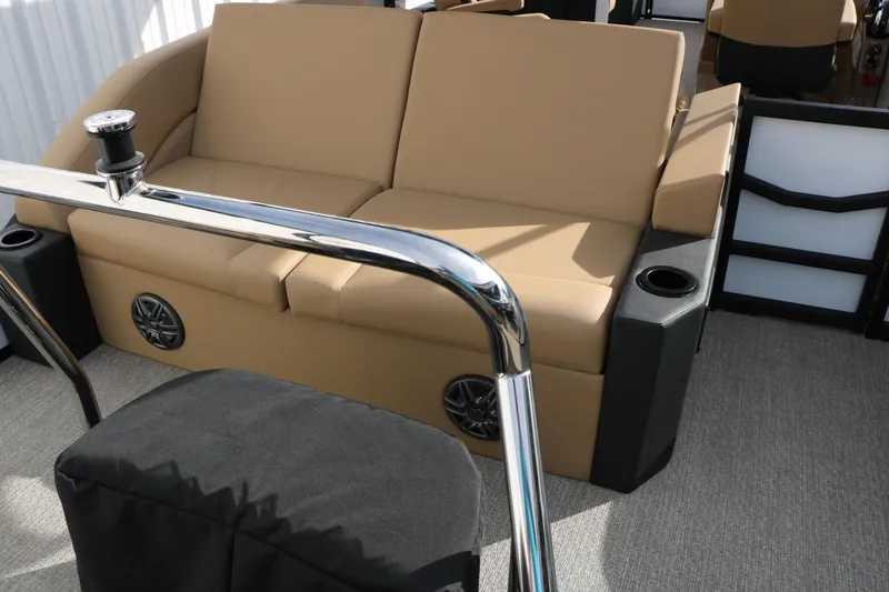 Slide: The Image of Luxurious seating on 2026 Evotti 523CS boat with cup holders and speakers. - 29
