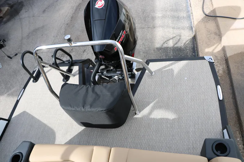 Slide: The Image of 2026 Evotti 523CS boat with outboard motor and beige seating. - 30