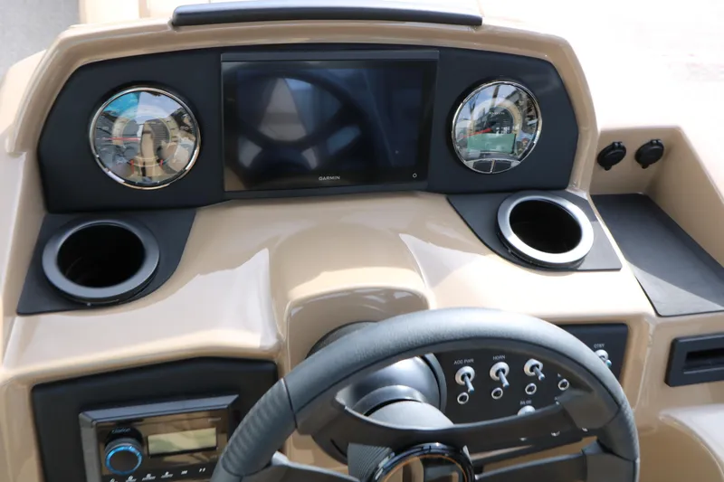 Slide: The Image of Dashboard of 2026 Evotti 523CS boat with steering wheel and digital display. - 39
