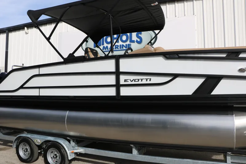 Slide: The Image of 2026 Evotti 523CS pontoon boat on trailer, displayed at Nichols Marine. - 8