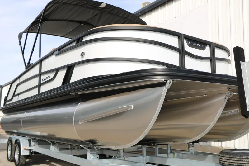 Slide: The Image of 2026 Evotti 523CS pontoon boat on trailer, featuring sleek design and modern aesthetics. - 9
