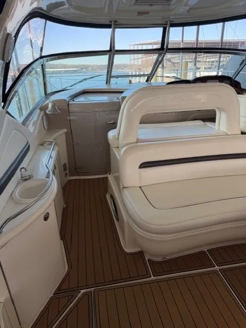Slide: The Image of Interior of a 2004 Sea Ray 420 Sundancer yacht with elegant seating. - 10