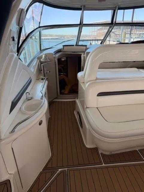 Slide: The Image of Interior of a 2004 Sea Ray 420 Sundancer yacht with elegant seating. - 11