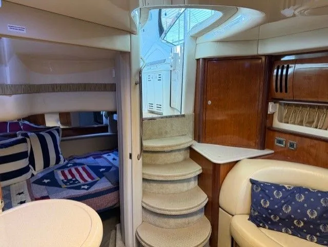 Slide: The Image of Interior of a 2004 Sea Ray 420 Sundancer yacht with stairs and cabin. - 20