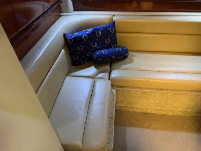 Slide: The Image of Interior of 2004 Sea Ray 420 Sundancer with beige sofa. - 22