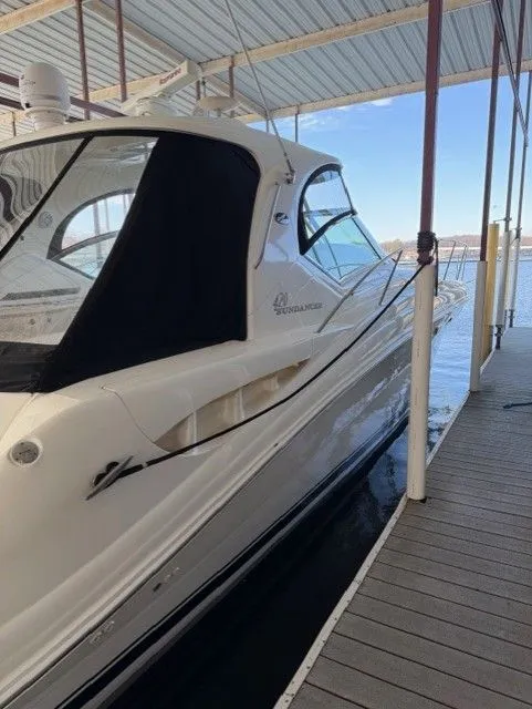 Slide: The Image of 2004 Sea Ray 420 Sundancer in a covered boat slip. - 3