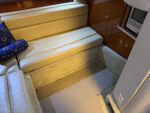 Slide: The Image of Interior of 2004 Sea Ray 420 Sundancer with beige sofa. - 30