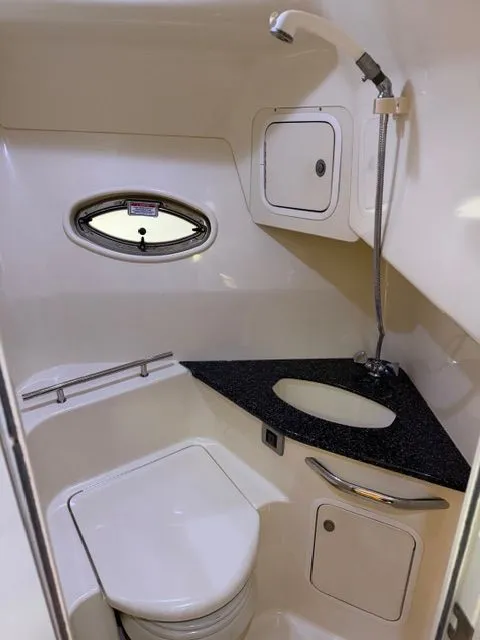Slide: The Image of Interior of 2004 Sea Ray 420 Sundancer with bathroom and shower. - 31