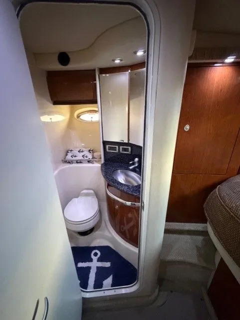 Slide: The Image of Interior of 2004 Sea Ray 420 Sundancer with bathroom. - 33