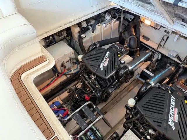 Slide: The Image of Engine room of 2004 Sea Ray 420 Sundancer with Mercury engines. - 39