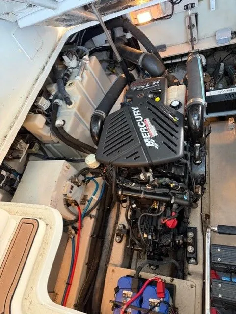 Slide: The Image of Engine compartment of a 2004 Sea Ray 420 Sundancer boat. - 43