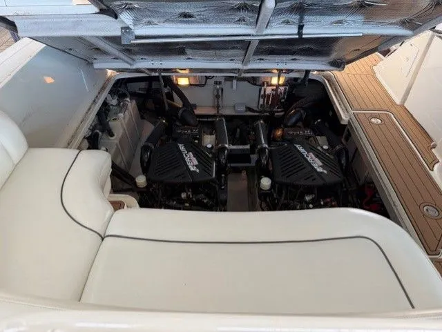 Slide: The Image of Engine compartment of 2004 Sea Ray 420 Sundancer with dual engines. - 45