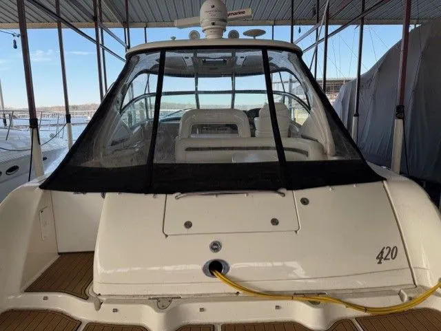 Slide: The Image of 2004 Sea Ray 420 Sundancer yacht docked in marina. - 7