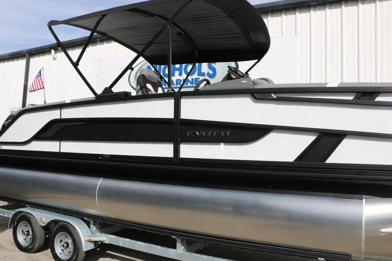The Image of 2026 Evotti 723QL pontoon boat on trailer, featuring sleek design and canopy. - 0