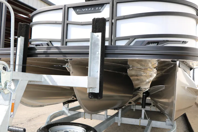 Slide: The Image of 2026 Evotti 723QL pontoon boat on trailer, showcasing sleek aluminum hull design. - 14