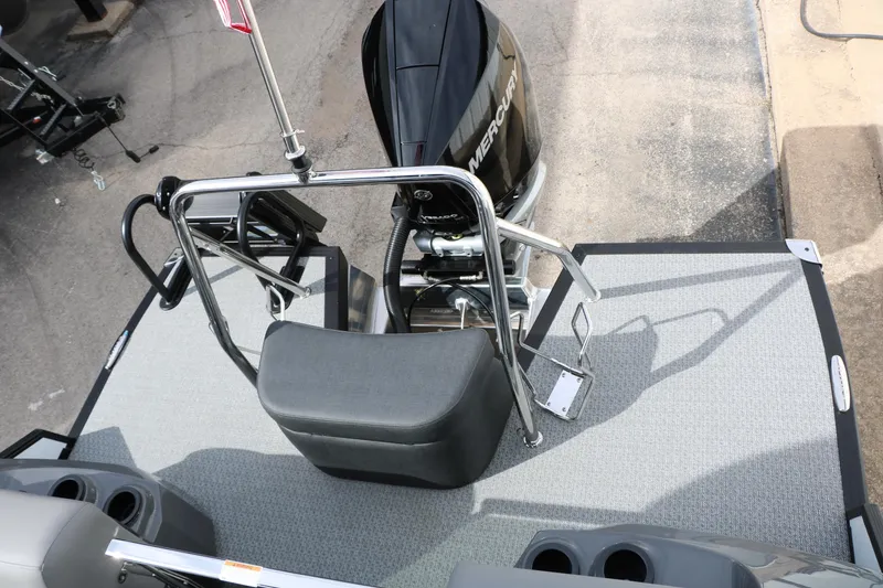 Slide: The Image of Rear view of 2026 Evotti 723QL boat with Mercury engine and seating area. - 29