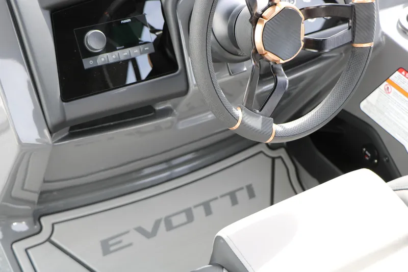 Slide: The Image of Steering wheel and dashboard of 2026 Evotti 723QL boat interior. - 35