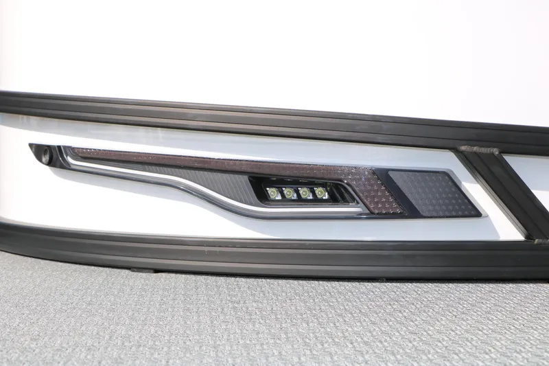 Slide: The Image of Close-up of 2026 Evotti 723QL vehicle's sleek LED headlight design. - 4