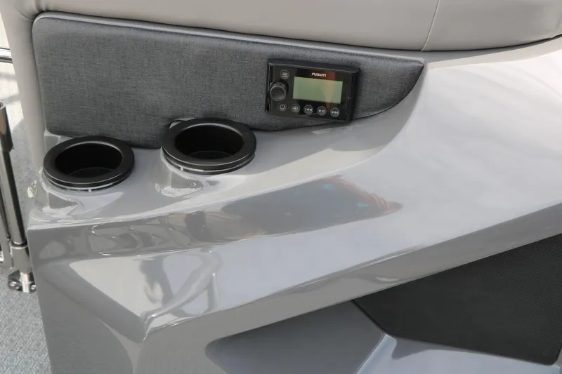 Slide: The Image of Interior of 2026 Evotti 723QL boat with cup holders and control panel. - 44