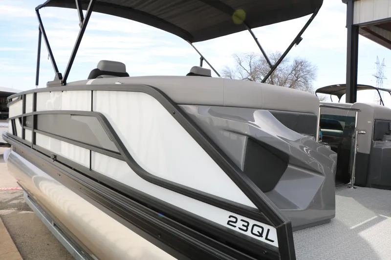 Slide: The Image of 2026 Evotti 723QL pontoon boat with sleek design and modern features. - 9