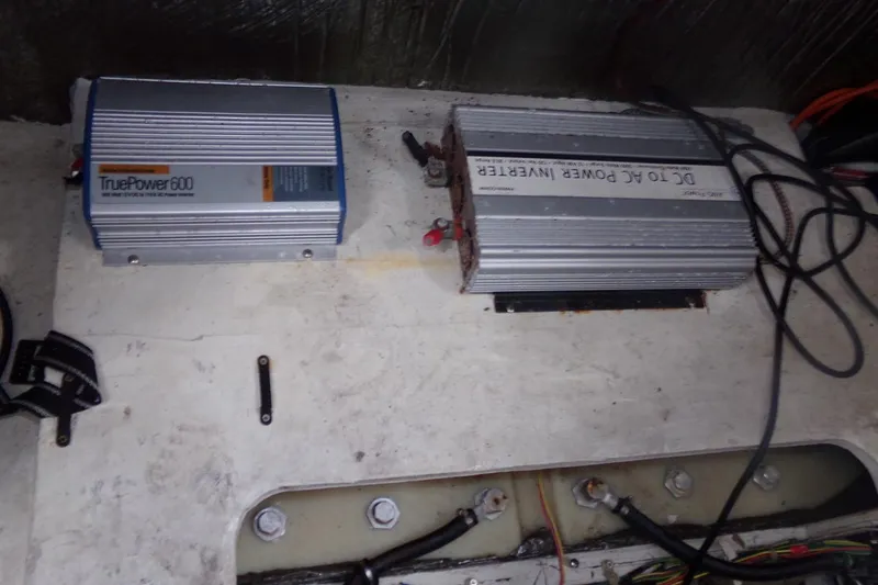 Slide: The Image of Electrical components in a 2006 Bayliner 325 boat, featuring TruePower 600 inverter. - 12