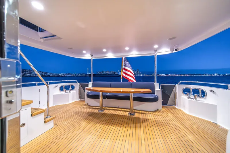 Slide: The Image of Luxurious 2013 Ocean Alexander 72 Pilothouse yacht deck with city skyline view. - 13