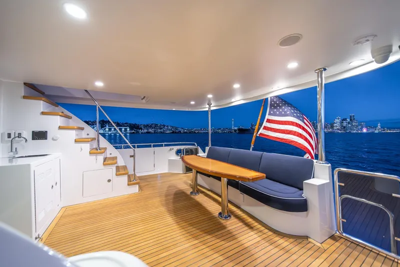 Slide: The Image of Luxurious 2013 Ocean Alexander 72 Pilothouse yacht deck with city skyline view. - 14