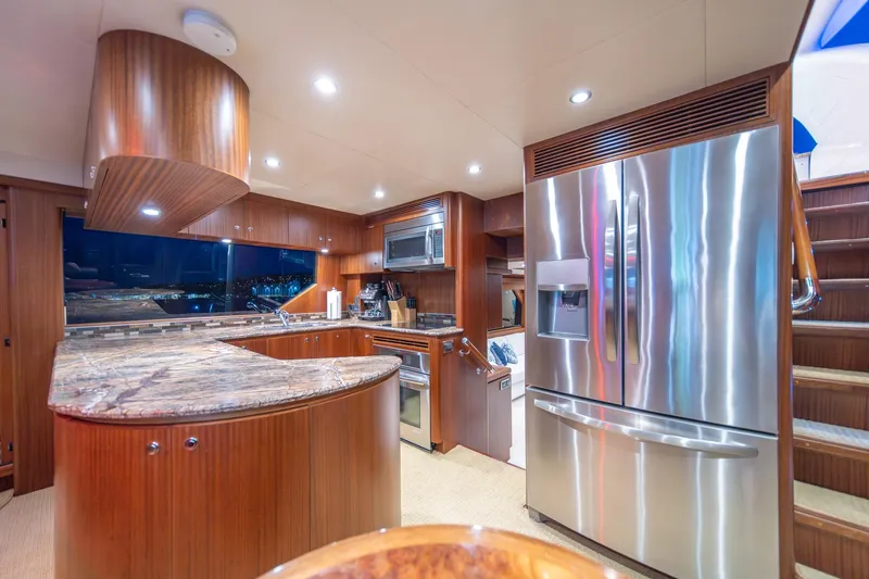 Slide: The Image of Luxurious kitchen interior of 2013 Ocean Alexander 72 Pilothouse yacht with modern appliances. - 22
