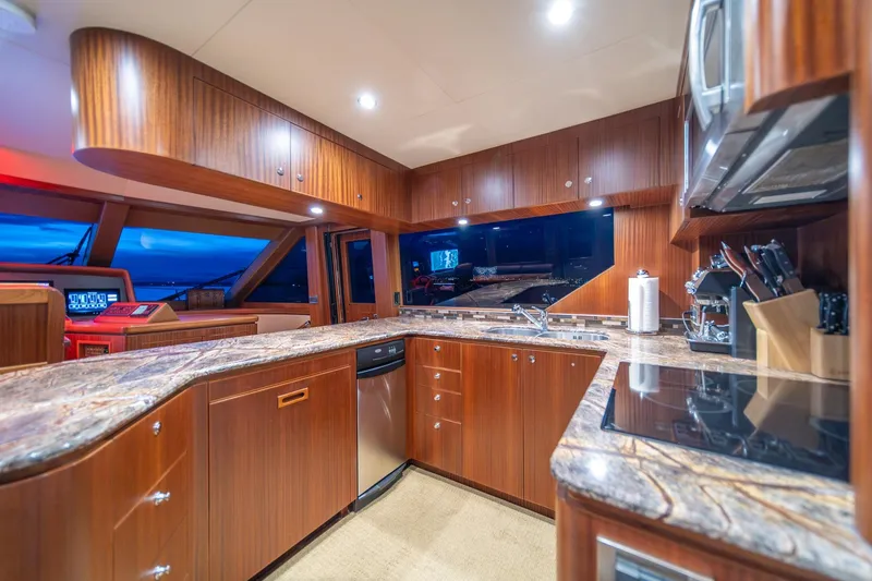 Slide: The Image of Luxurious kitchen interior of 2013 Ocean Alexander 72 Pilothouse yacht with modern amenities. - 23