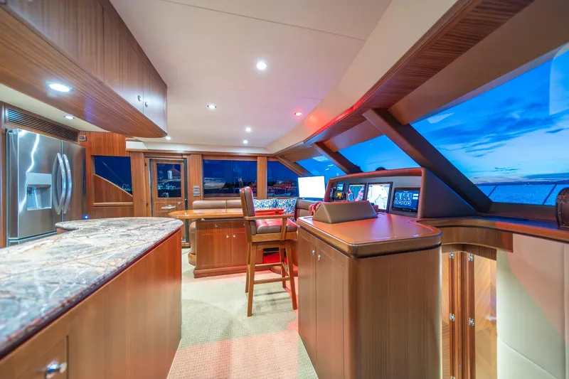 Slide: The Image of Luxurious interior of 2013 Ocean Alexander 72 Pilothouse yacht with modern navigation equipment. - 25