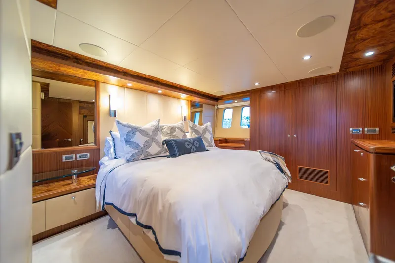 Slide: The Image of Luxurious bedroom interior of 2013 Ocean Alexander 72 Pilothouse yacht with elegant wood finishes. - 27