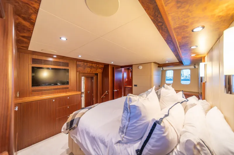 Slide: The Image of Luxurious bedroom interior of 2013 Ocean Alexander 72 Pilothouse yacht with elegant wood finishes. - 28