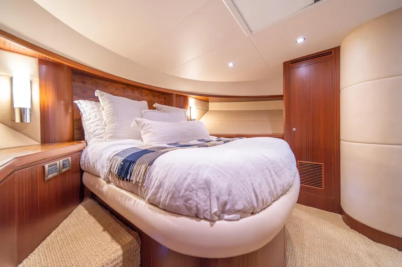 Slide: The Image of Luxurious bedroom interior of 2013 Ocean Alexander 72 Pilothouse yacht with elegant wood finishes. - 32