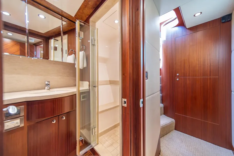Slide: The Image of Luxurious bathroom interior of 2013 Ocean Alexander 72 Pilothouse yacht with wood accents. - 34
