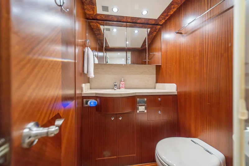 Slide: The Image of Luxurious bathroom in 2013 Ocean Alexander 72 Pilothouse yacht with wood paneling and modern fixtures. - 36