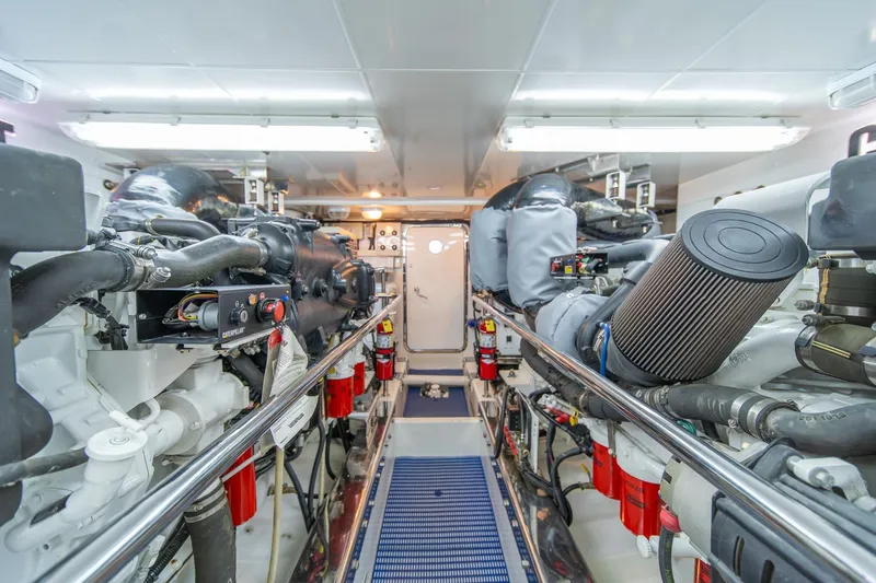 Slide: The Image of Engine room of 2013 Ocean Alexander 72 Pilothouse yacht, featuring advanced machinery and equipment. - 38
