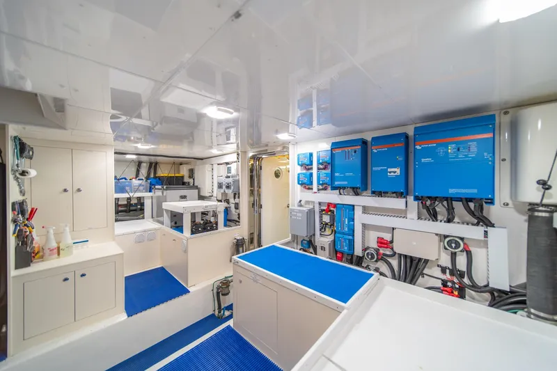 Slide: The Image of Engine room of 2013 Ocean Alexander 72 Pilothouse yacht, featuring advanced electrical systems. - 42