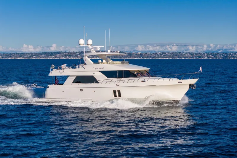 Slide: The Image of Ocean Alexander 72 Pilothouse yacht cruising on open water, 2013 model. - 5