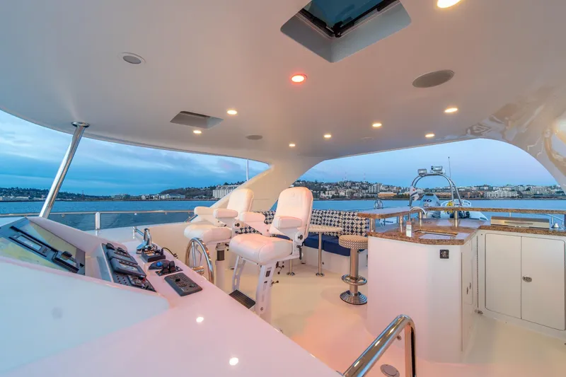 Slide: The Image of Luxurious 2013 Ocean Alexander 72 Pilothouse yacht interior with helm and seating area. - 6